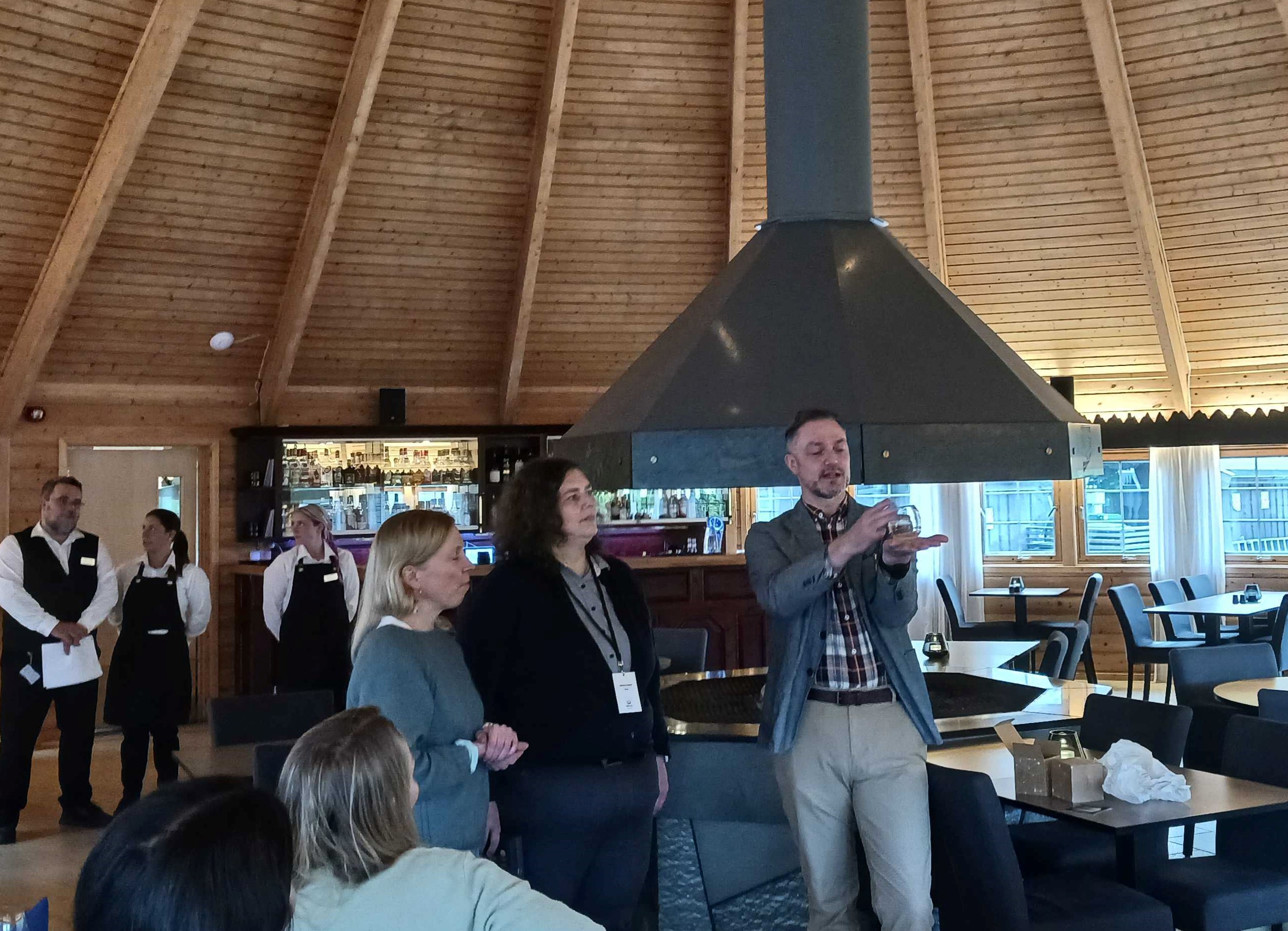 Presentation of UArctic glass for Mona Johnson.