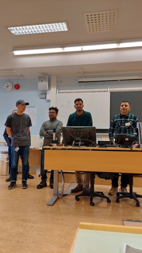 Researchers presenting research papers & sharing research ideas.